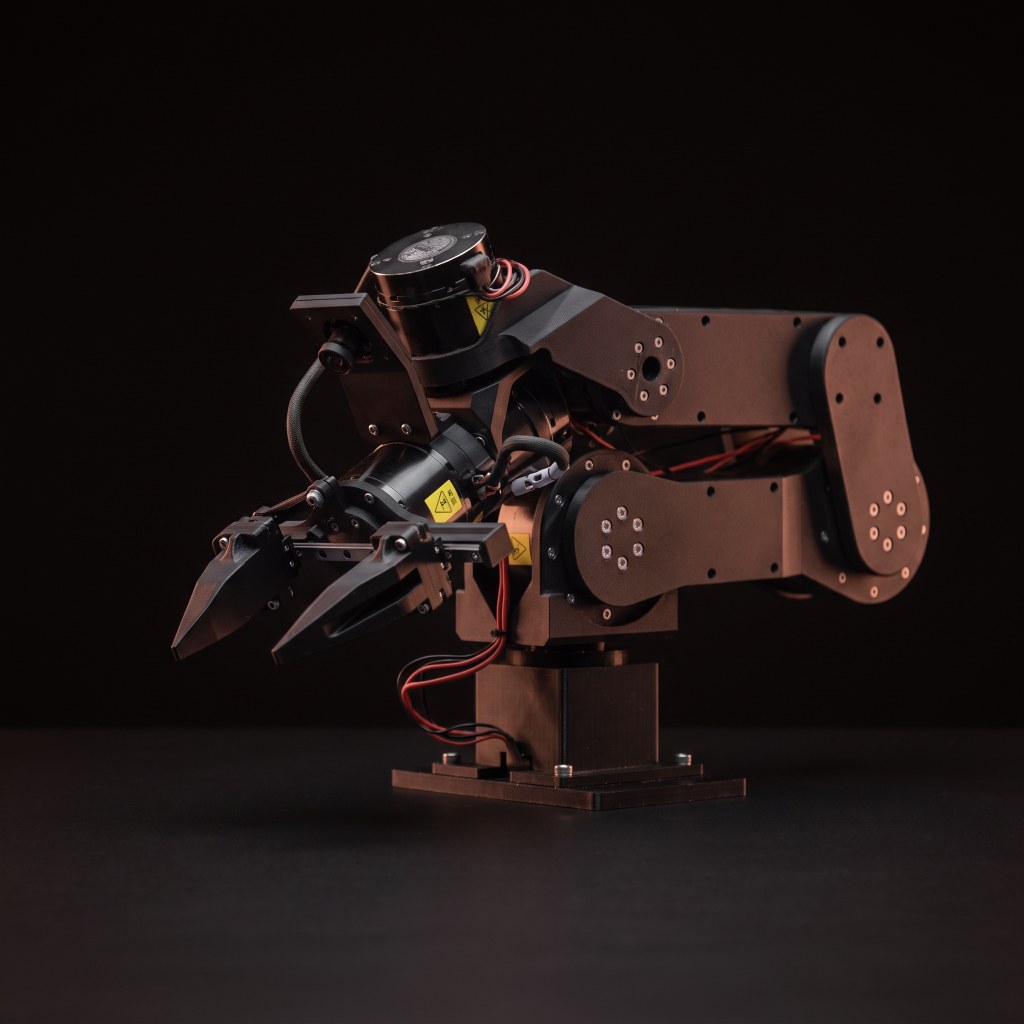 Maker Arm, dark studio shot